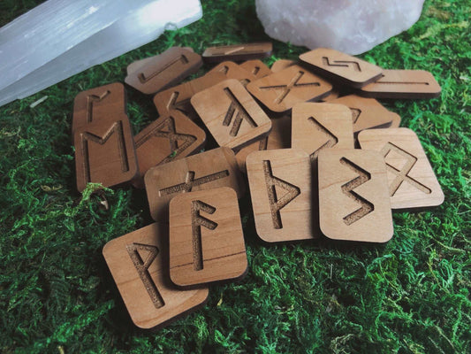 Pictured are handmade wood tile runes.