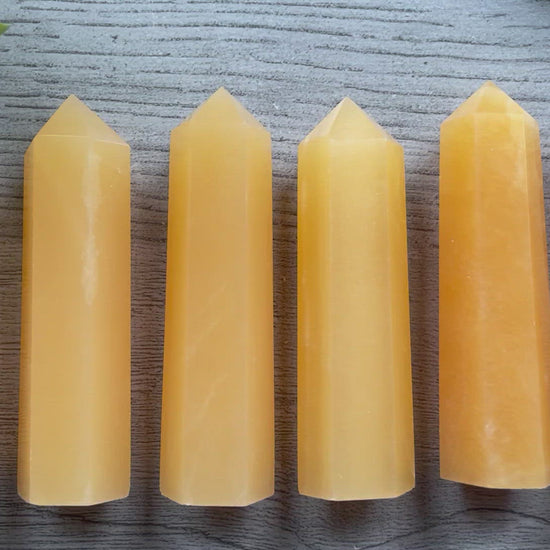 Pictured are various points of orange calcite.