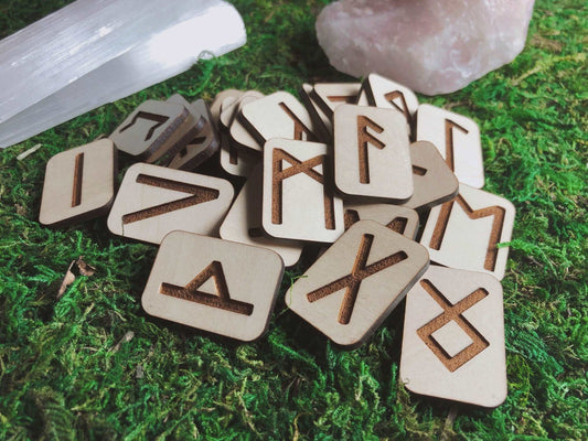 Pictures are handmade wood rile runes.