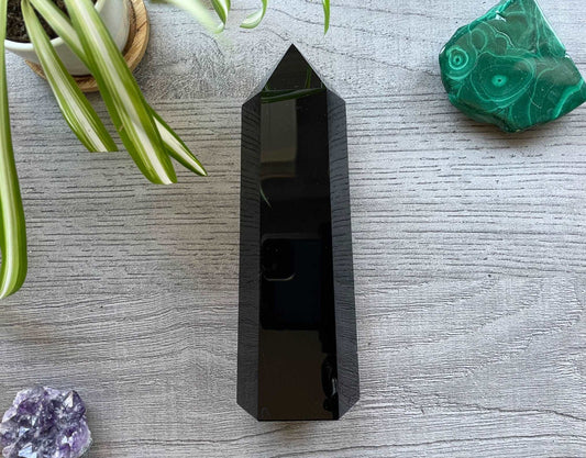 Pictured is a tower carved out of black obsidian.