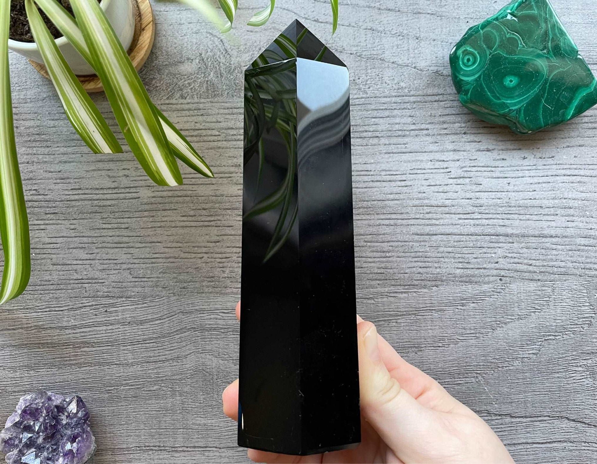 Pictured is a tower carved out of black obsidian.