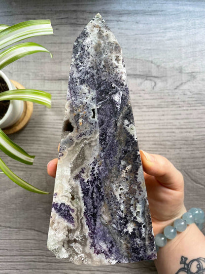 Pictured is a tower carved out of purple fluorite and sphalerite.
