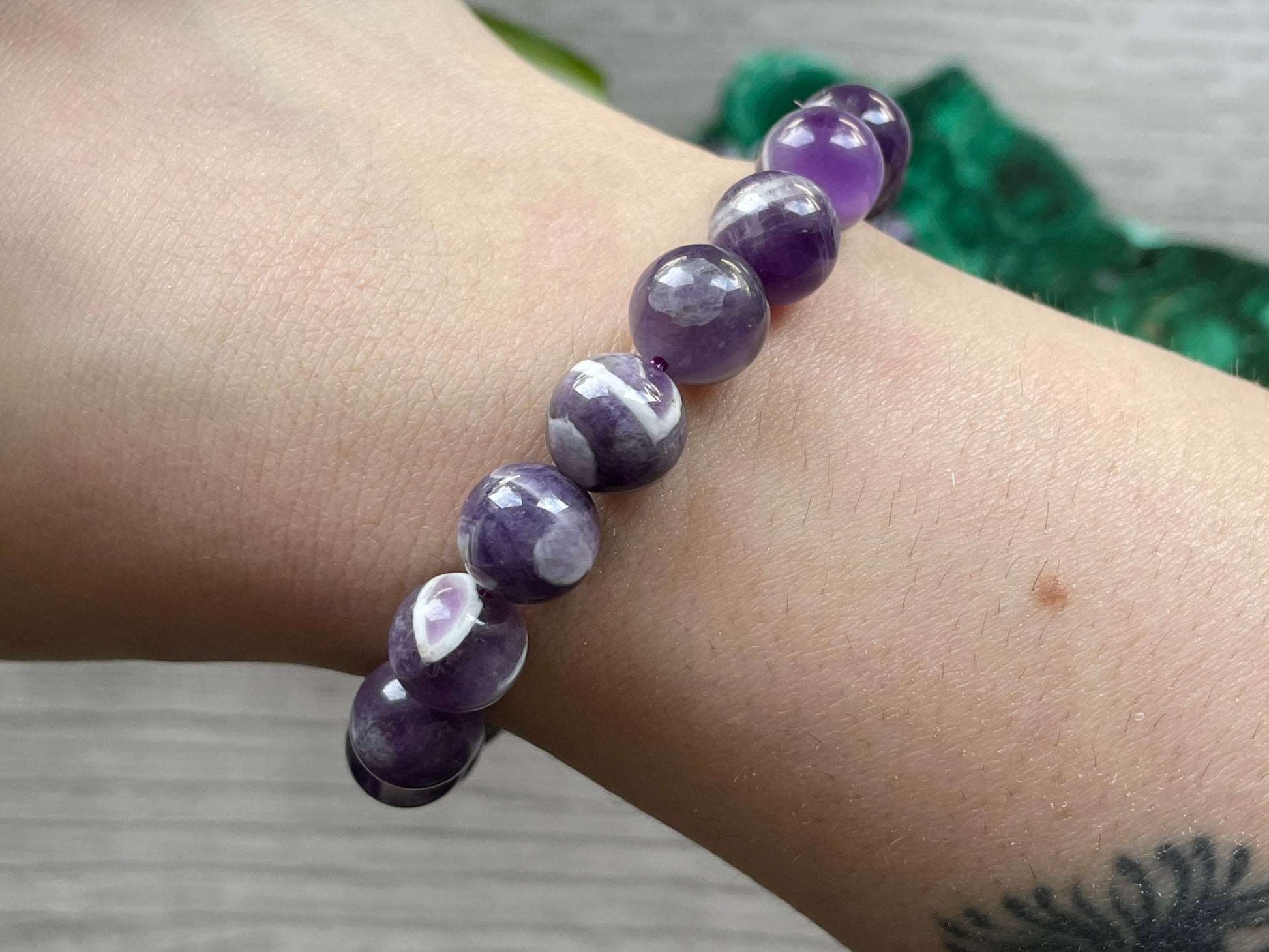 Pictured is a dream amethyst bead bracelet.