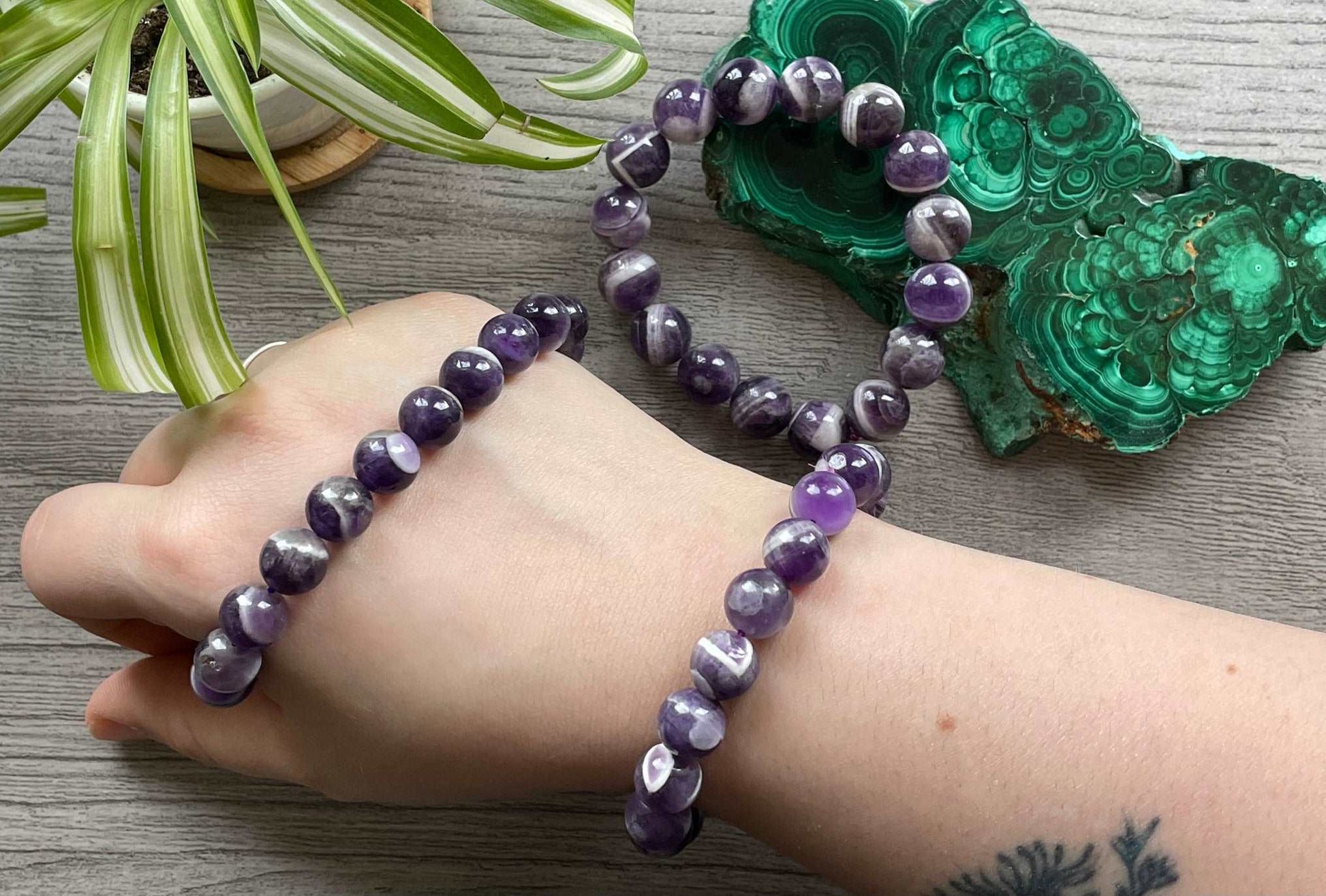 Pictured is a dream amethyst bead bracelet.