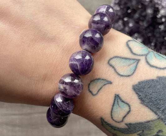 Pictured is a chevron amethyst bead bracelet.