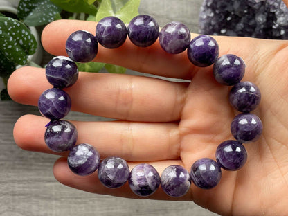 Pictured is a chevron amethyst bead bracelet.