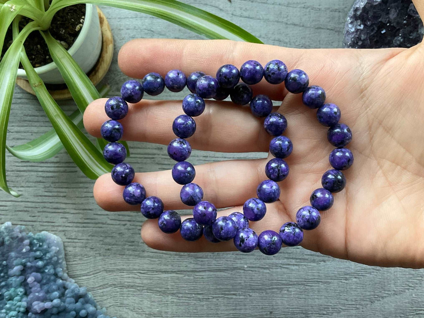 Pictured is a faux charoite bead bracelet.