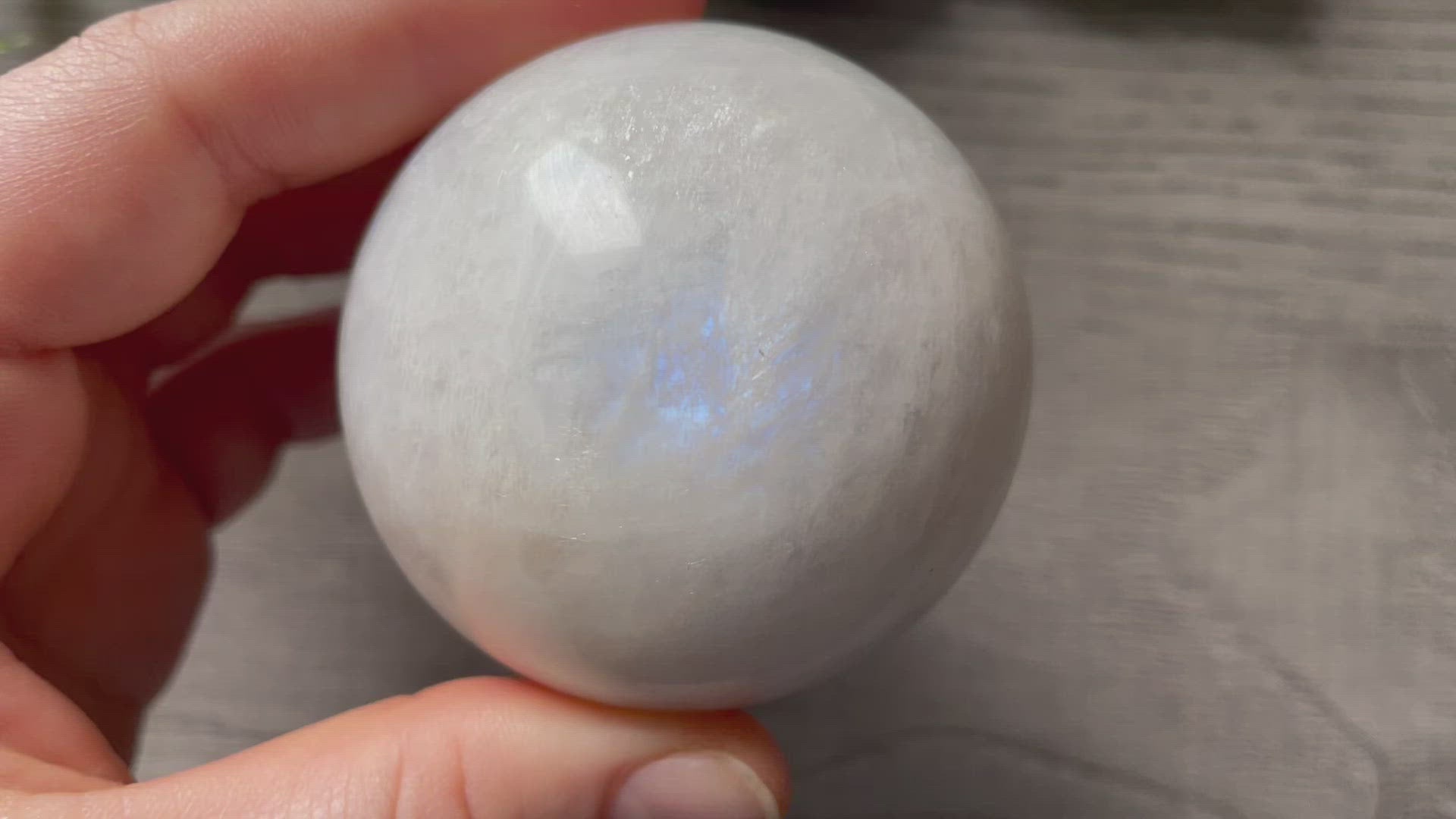 Pictured is a sphere carved out of white moonstone.