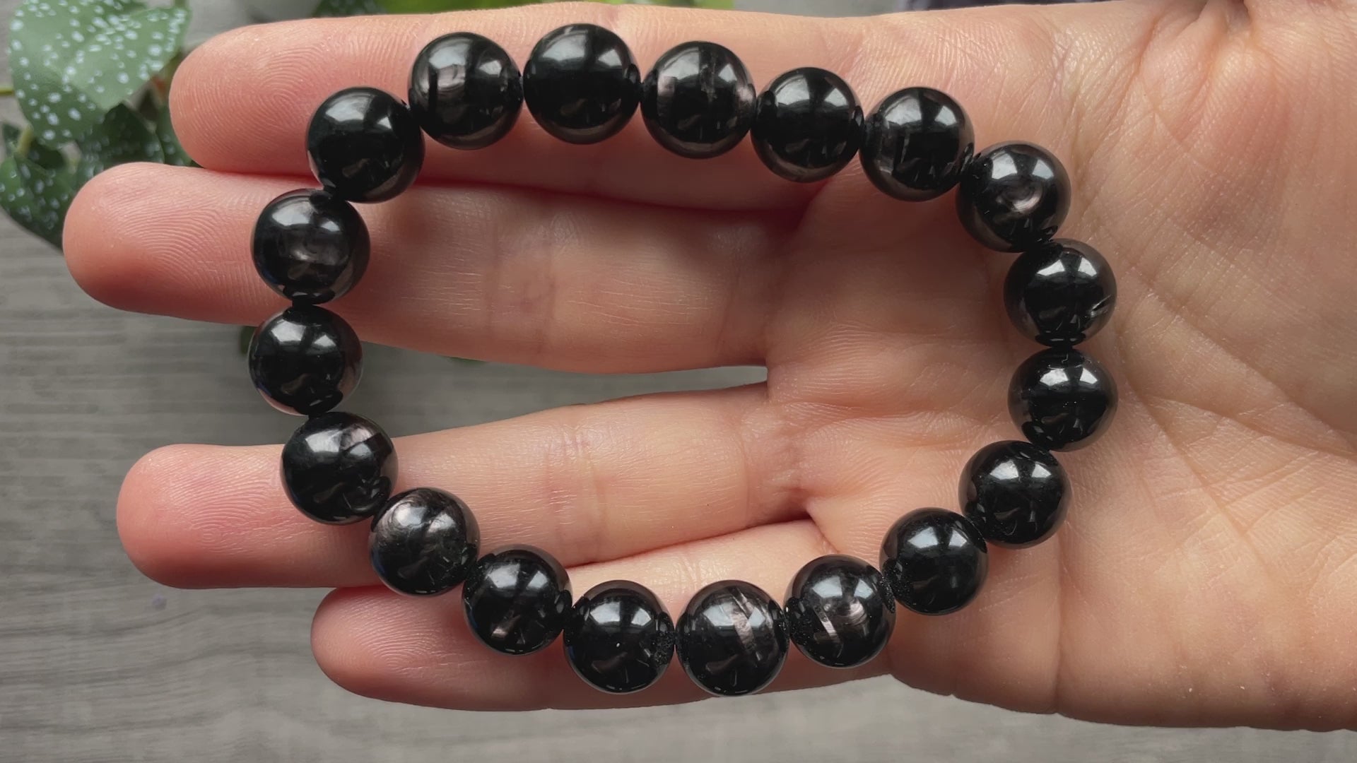 Pictured is a hypersthene bead bracelet.