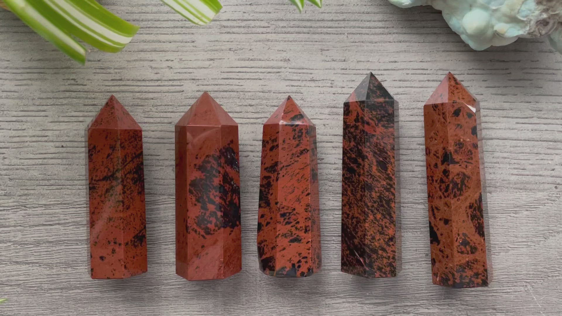 Pictured are various points of mahogany obsidian.