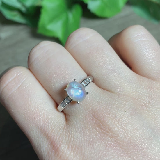 Pictured is a white moonstone gemstone set in an S925 sterling silver ring.