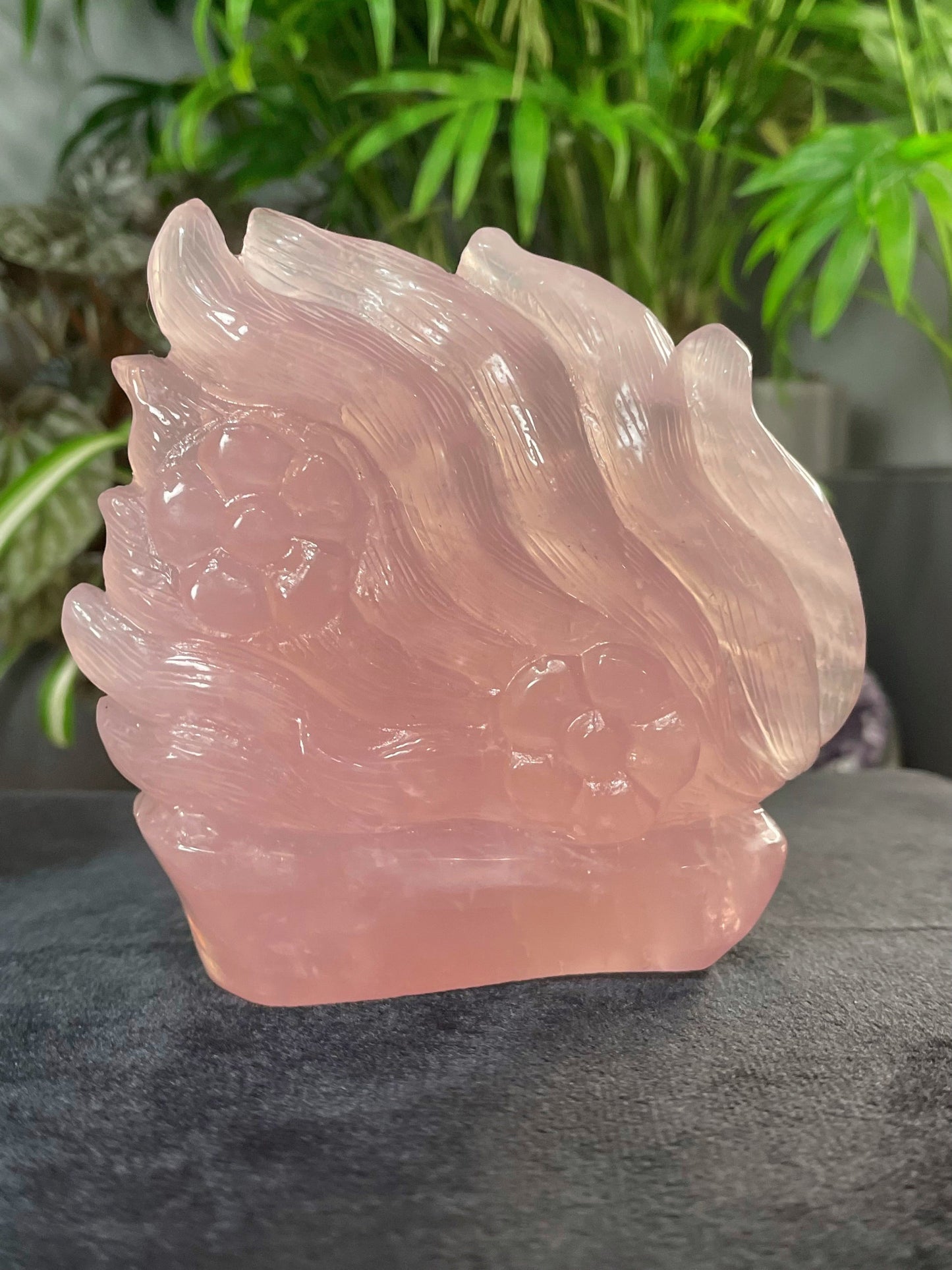 Pictured is a nine-tailed fox carved out of rose quartz.