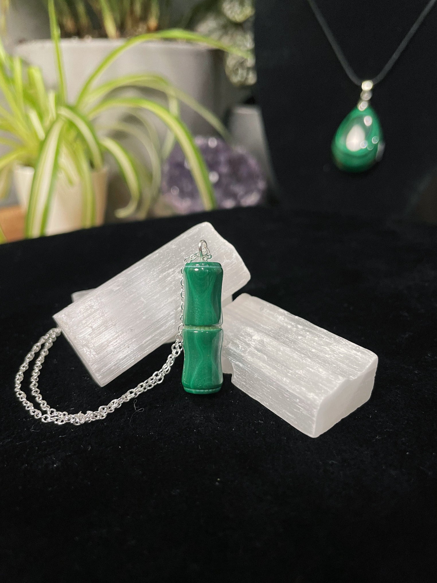 Pictured is a bamboo malachite necklace.