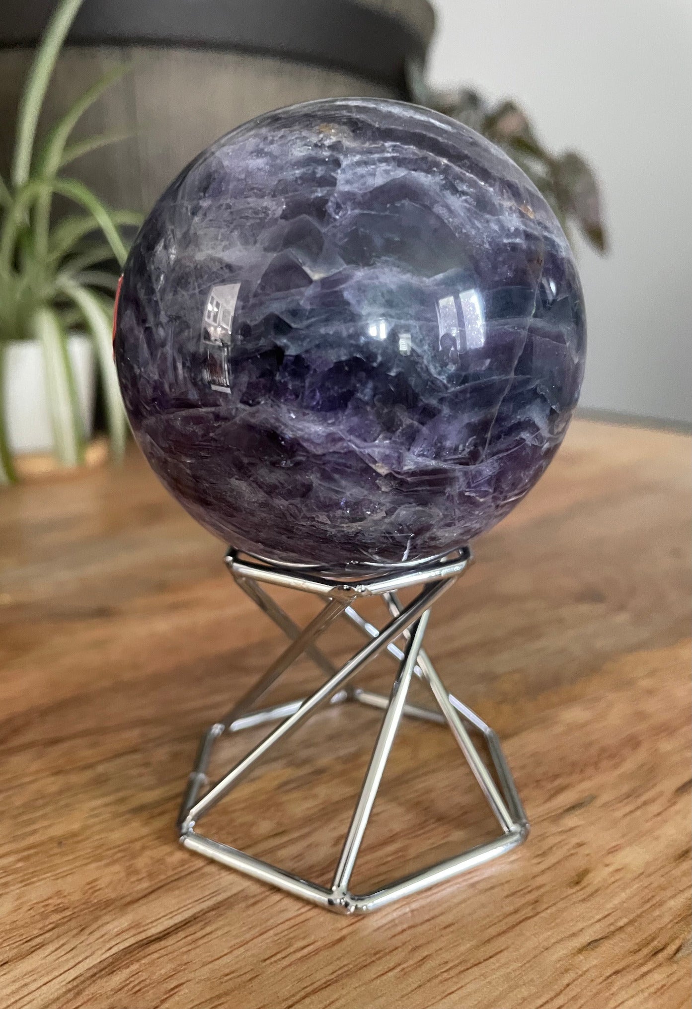 Pictured is a metal sphere stand.