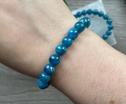 Pictured is a blue apatite bead bracelet.