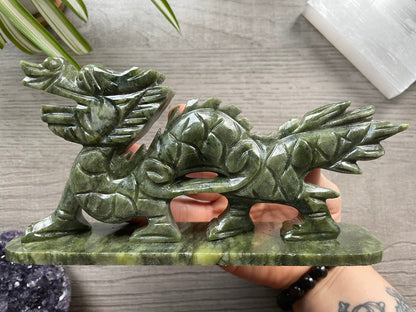 PIctured is a dragon carved out of Xiuyan jade.