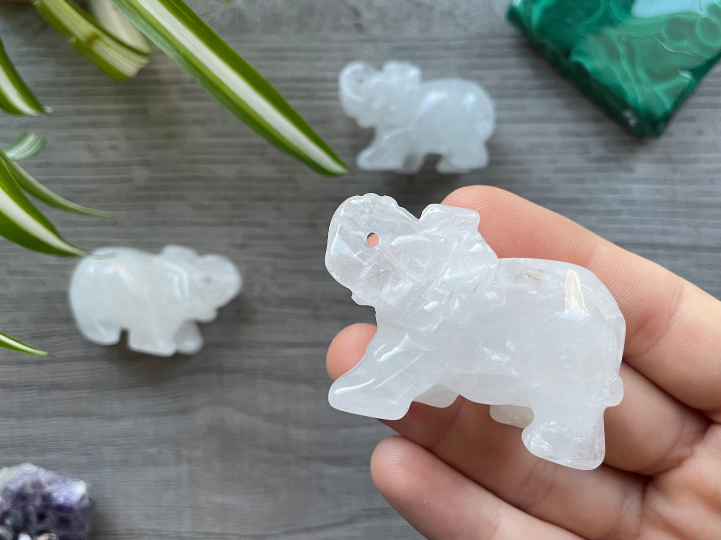 Pictured are various elephants carved out of quartz.