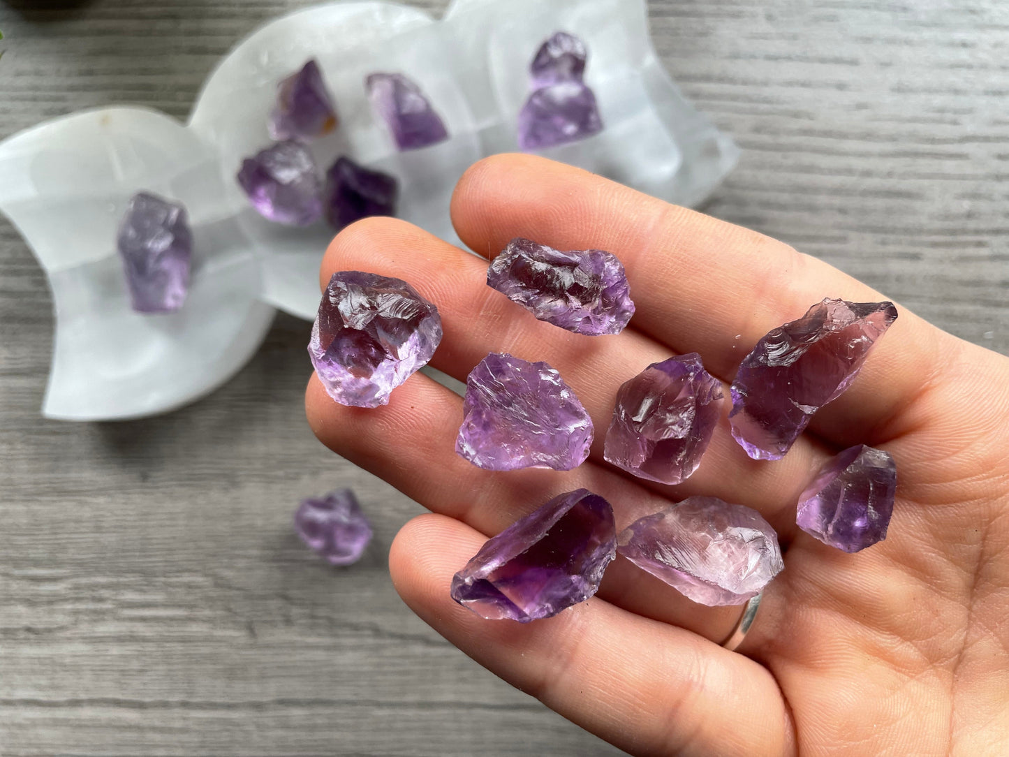Pictured are pieces of raw amethyst.