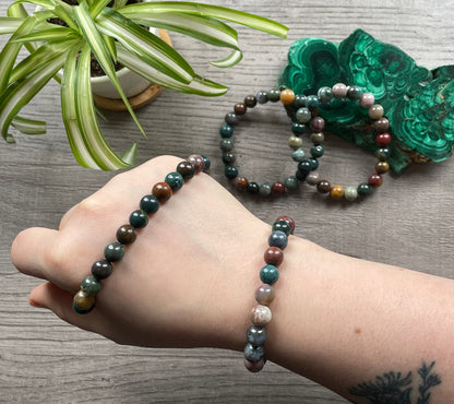 Pictured is a ocean jasper bead bracelet.