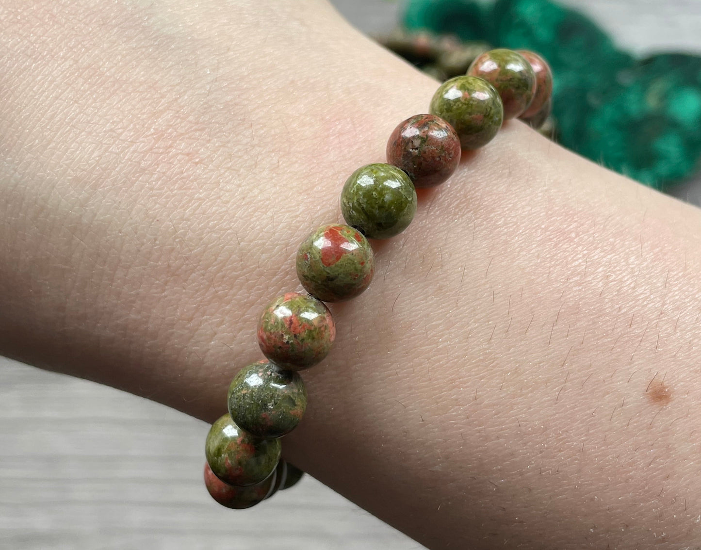 Pictured is a unakite bead bracelet.