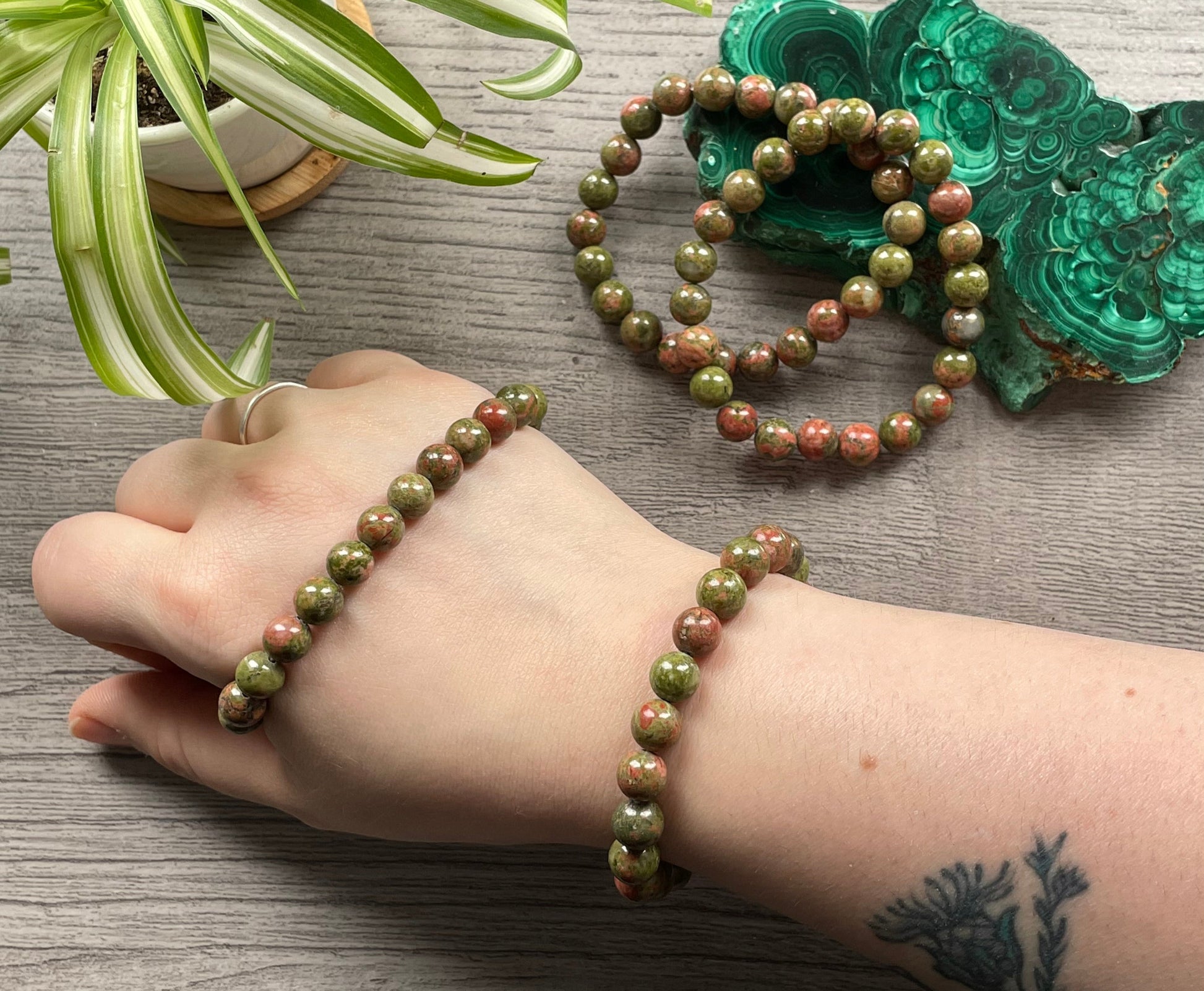 Pictured is a unakite bead bracelet.