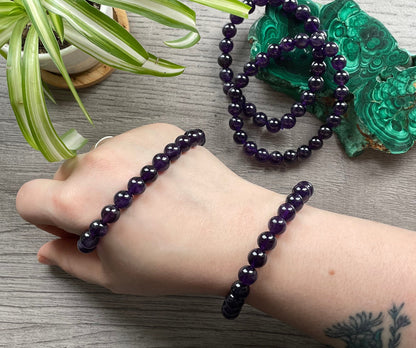 Pictured is an amethyst bead bracelet.