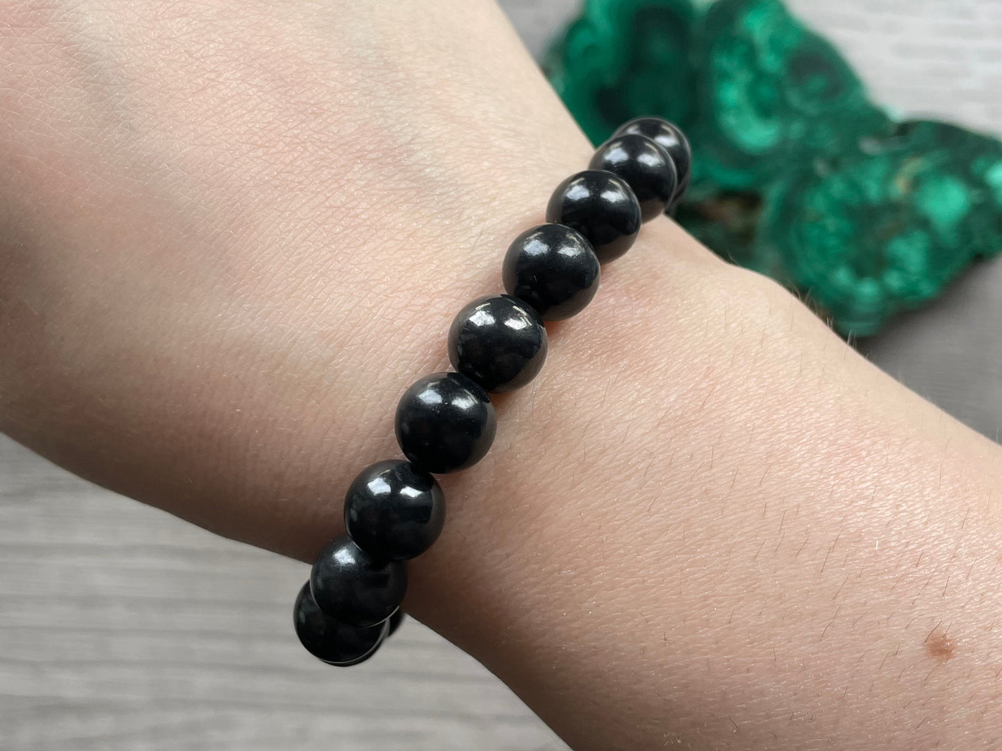 Pictured is a shungite bead bracelet.