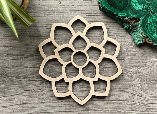 Pictured is a wood sphere stand in the shape of a flower.