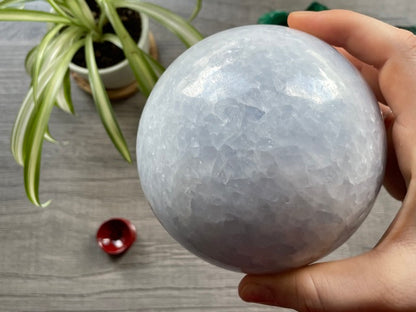 Pictured is a sphere carved out of blue calcite.