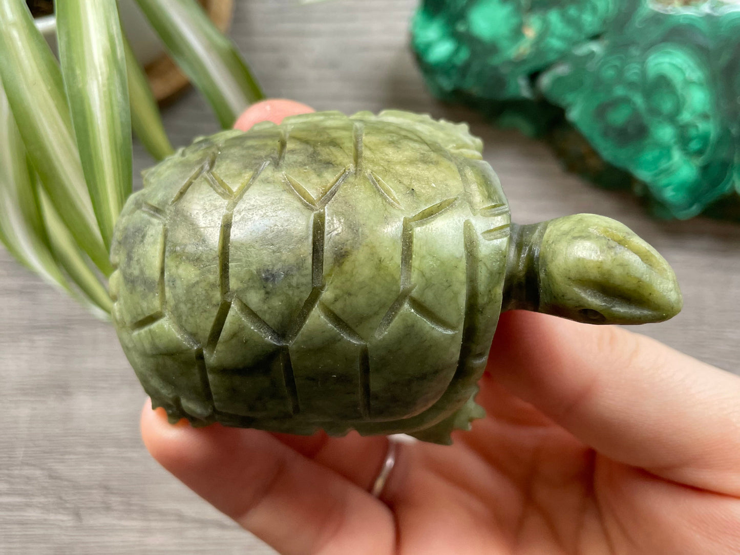 Pictured is a turtle carved out of Xiuyan jade.