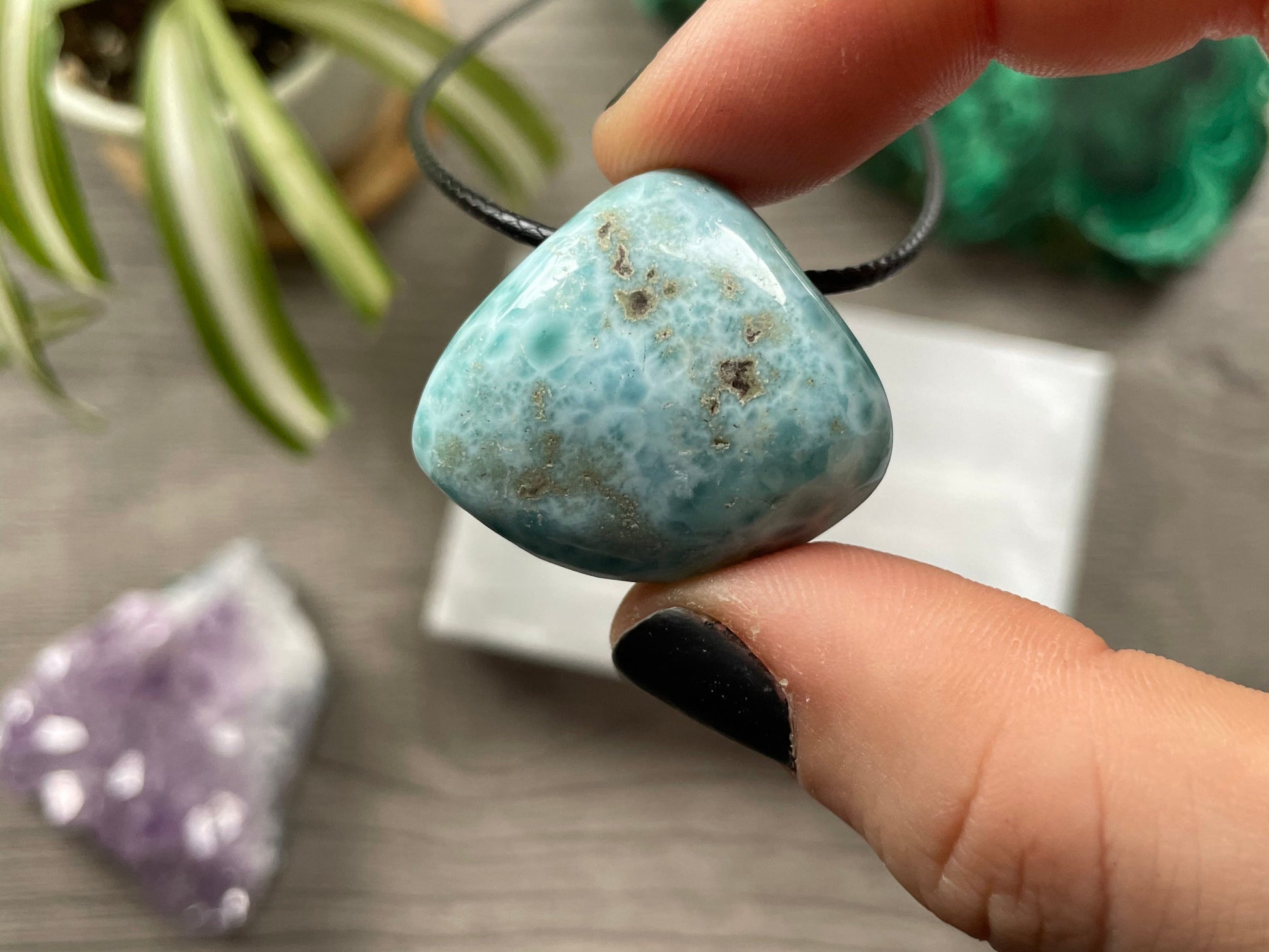 Pictured is a larimar necklace.