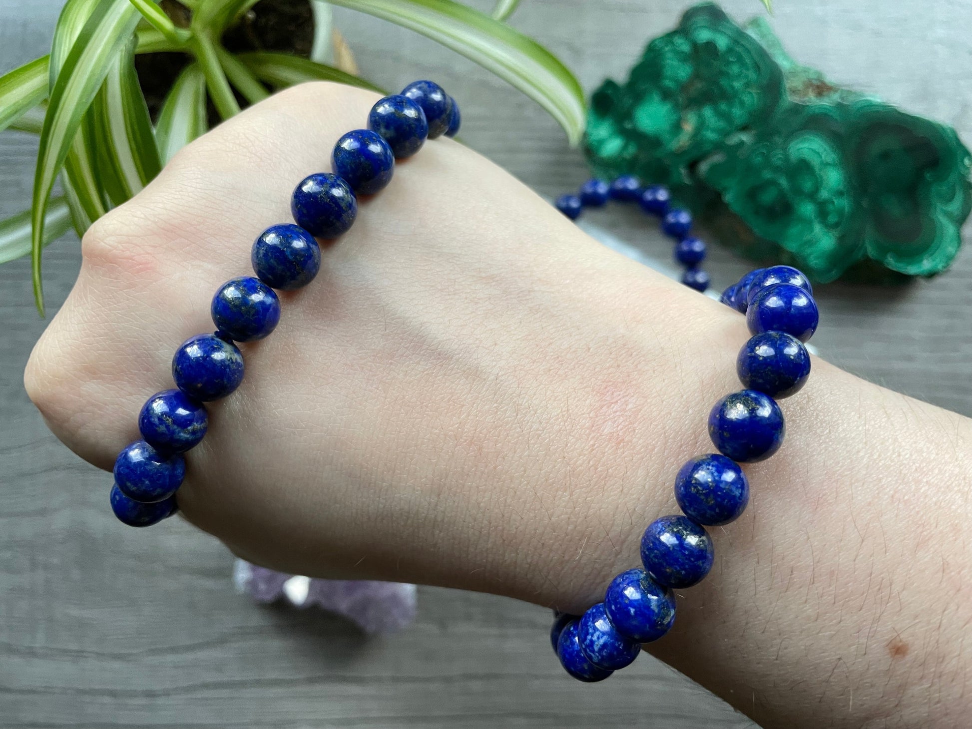 Pictured is a lapis lazuli bead bracelet.