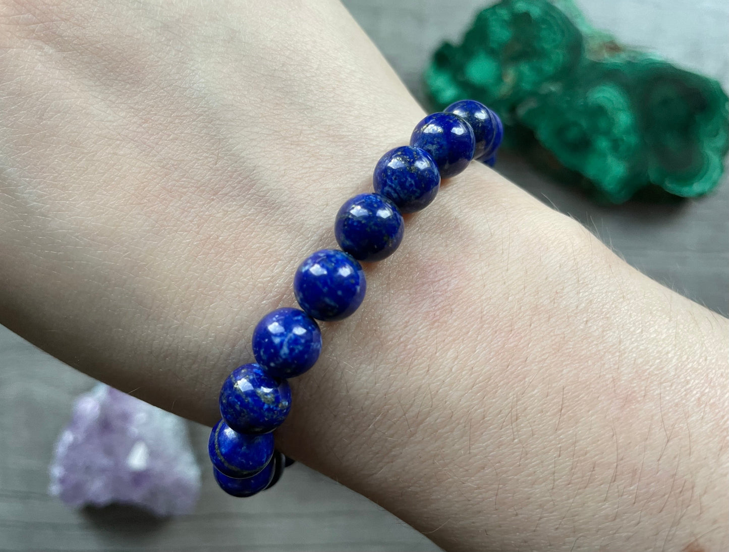 Pictured is a lapis lazuli bead bracelet.