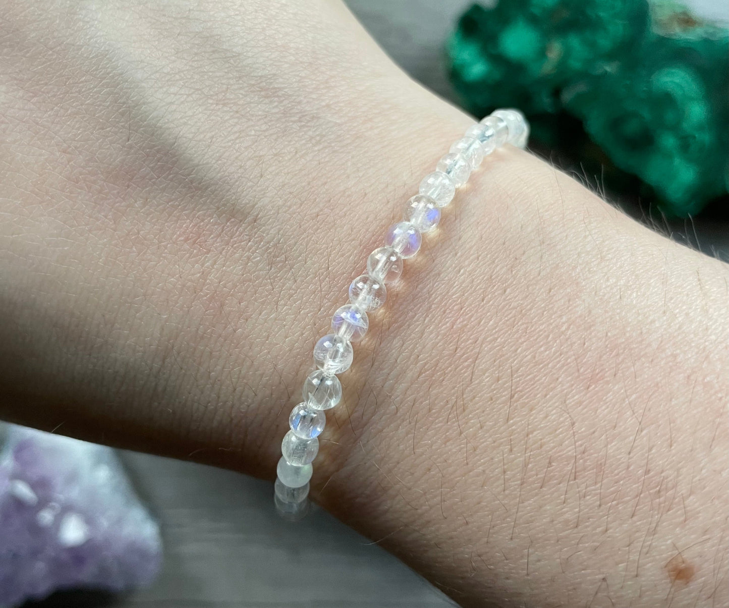 Pictured is a white moonstone bead bracelet.