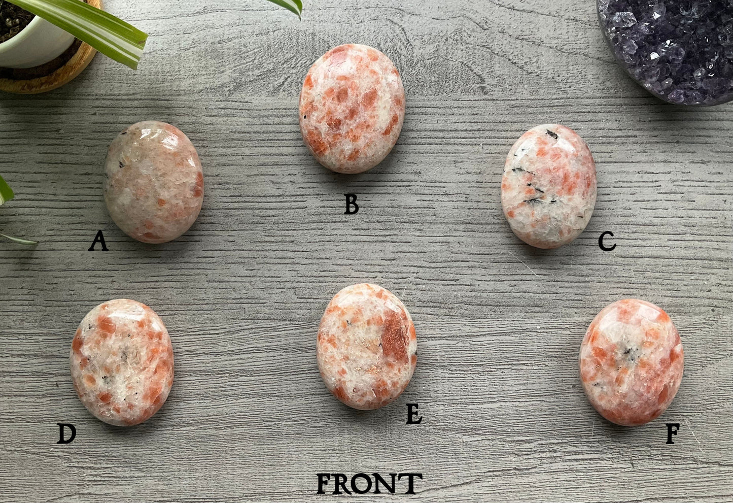Pictured are various polished sunstone stones.
