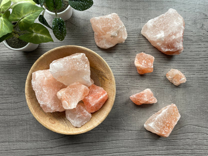 Pictured are various pieces of raw himalayan salt.