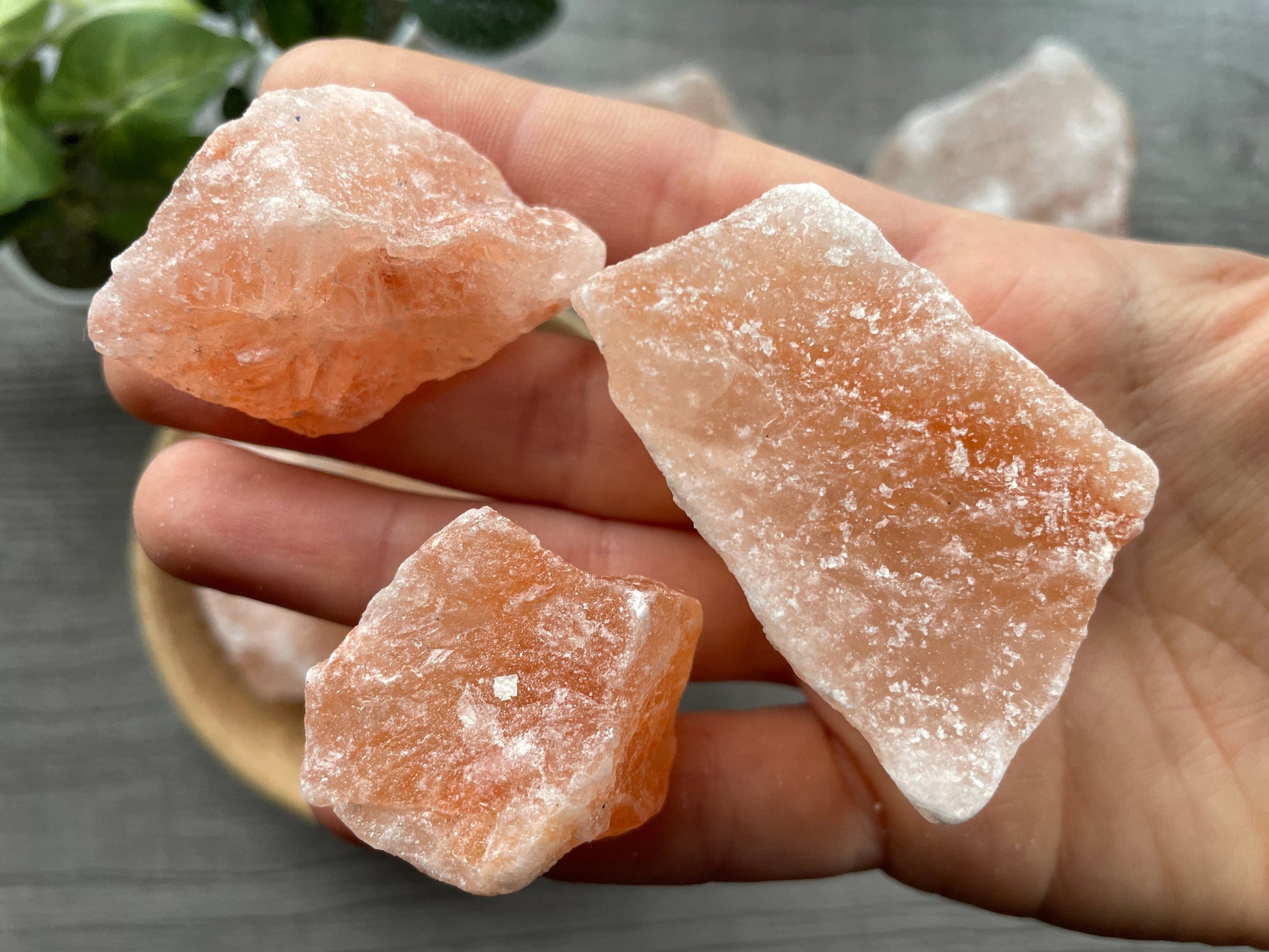 Pictured are various pieces of raw himalayan salt.