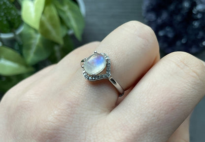 Pictured is a white moonstone gemstone set in an S925 sterling silver ring.