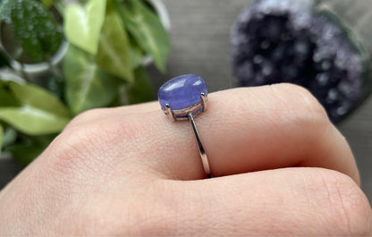 Pictured is an iolite gemstone set in an S925 sterling silver ring.