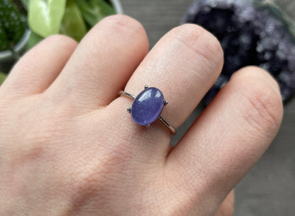 Pictured is an iolite gemstone set in an S925 sterling silver ring.