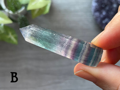Pictured are various points of rainbow fluorite.