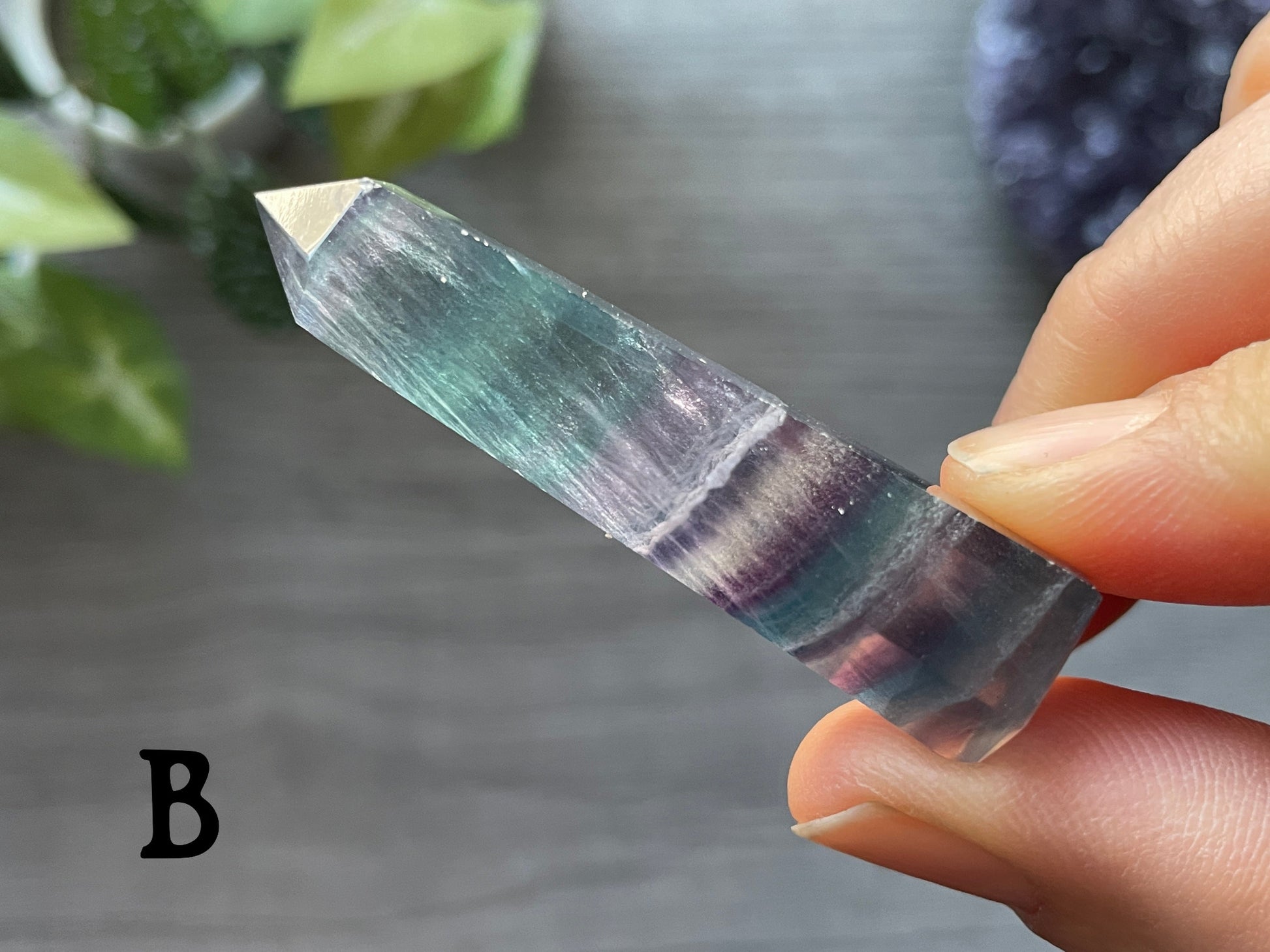 Pictured are various points of rainbow fluorite.