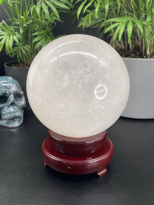 Pictured is a sphere carved out of clear quartz.