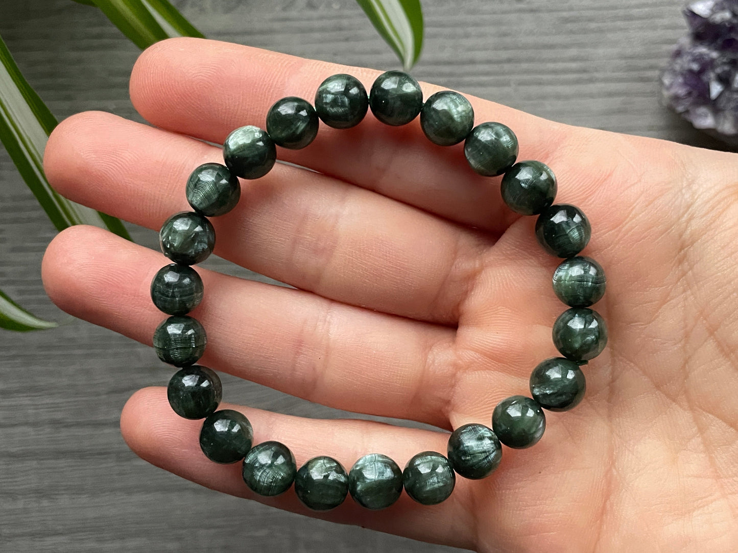 Pictured is a seraphinite bead bracelet.