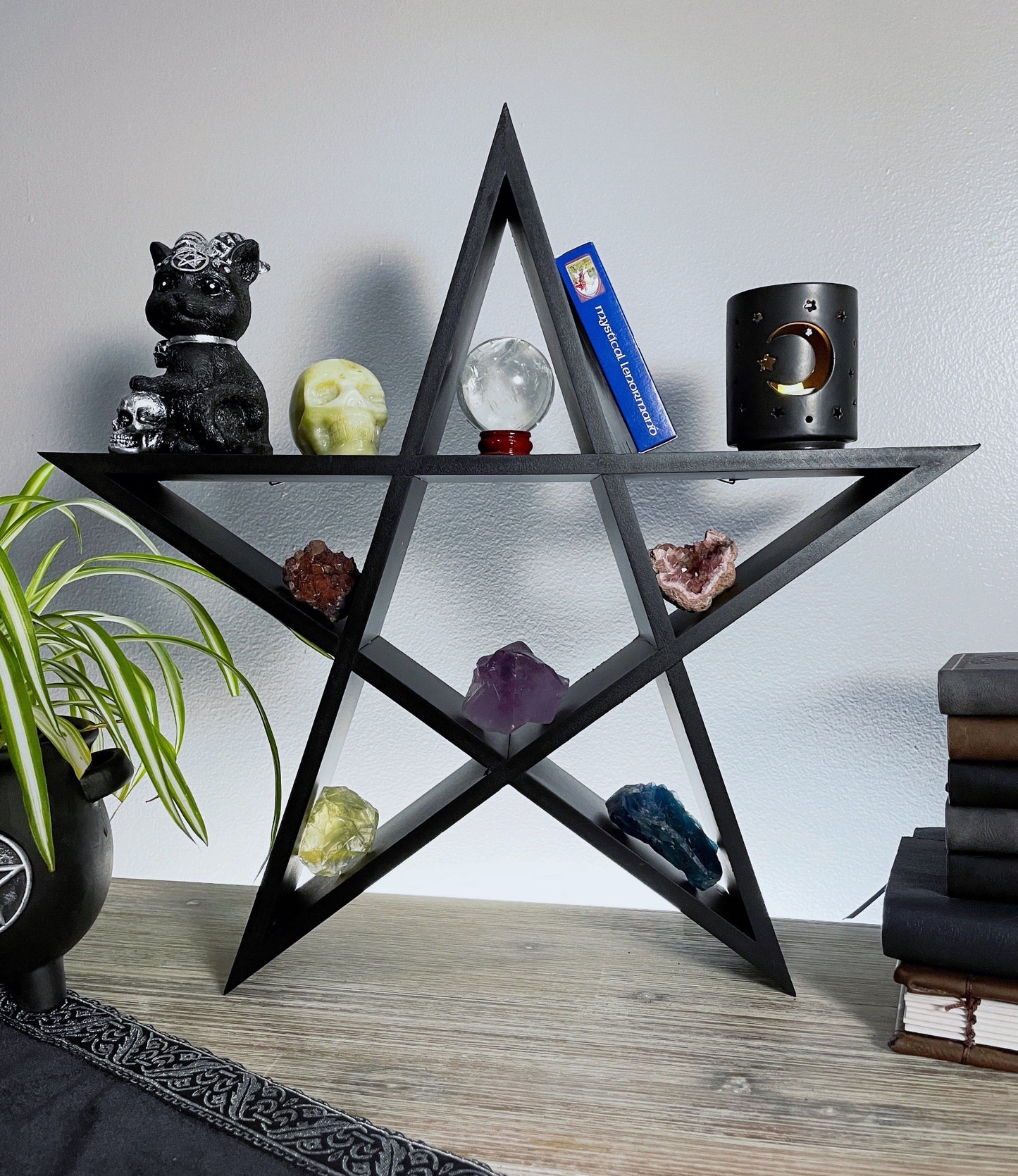 Pictured is a shelving unit shaped like a pentagram