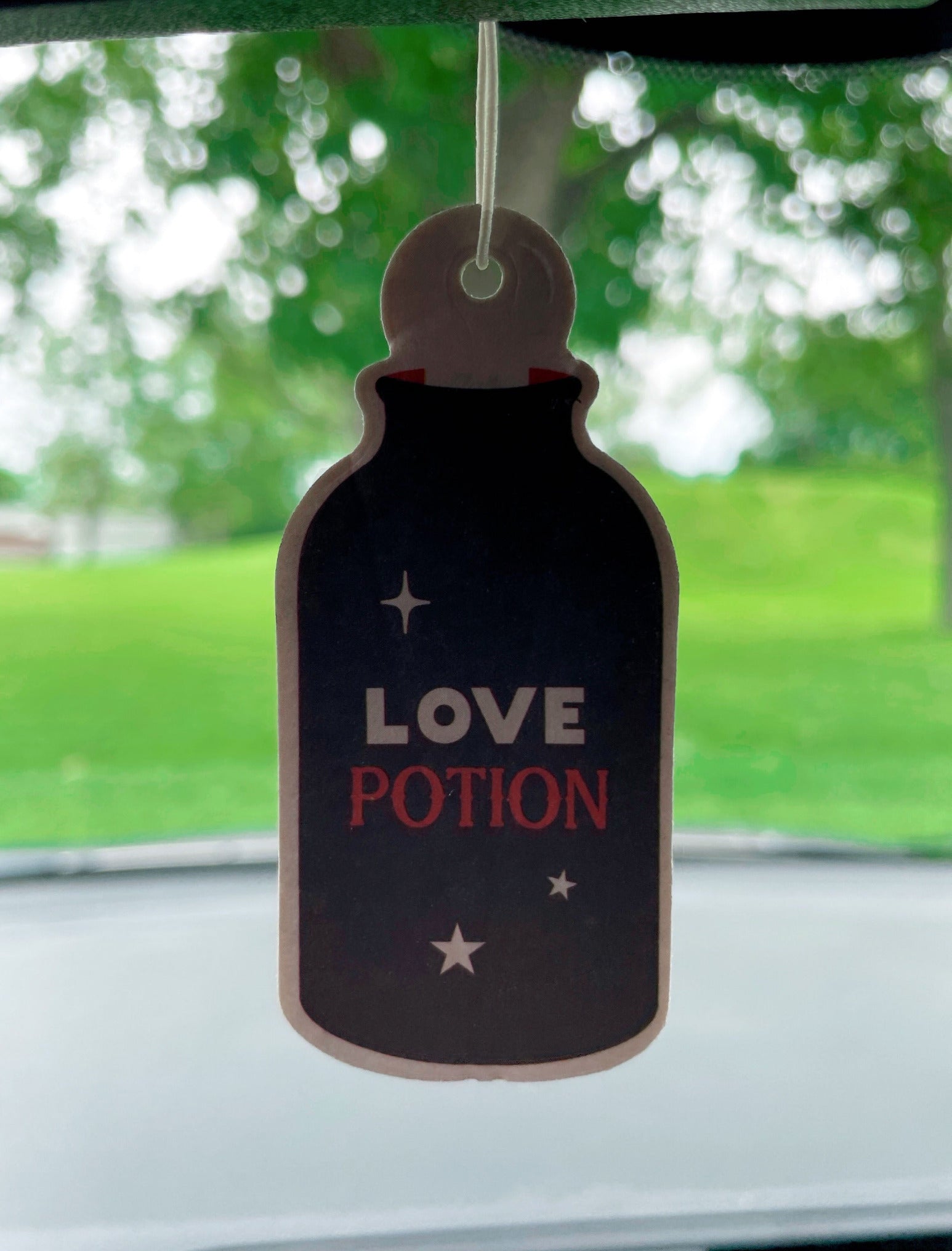 Pictured is an air freshener in the shape of love potion.