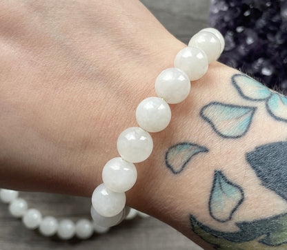 Pictured is a white chalcedony bead bracelet.