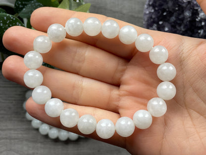 Pictured is a white chalcedony bead bracelet.