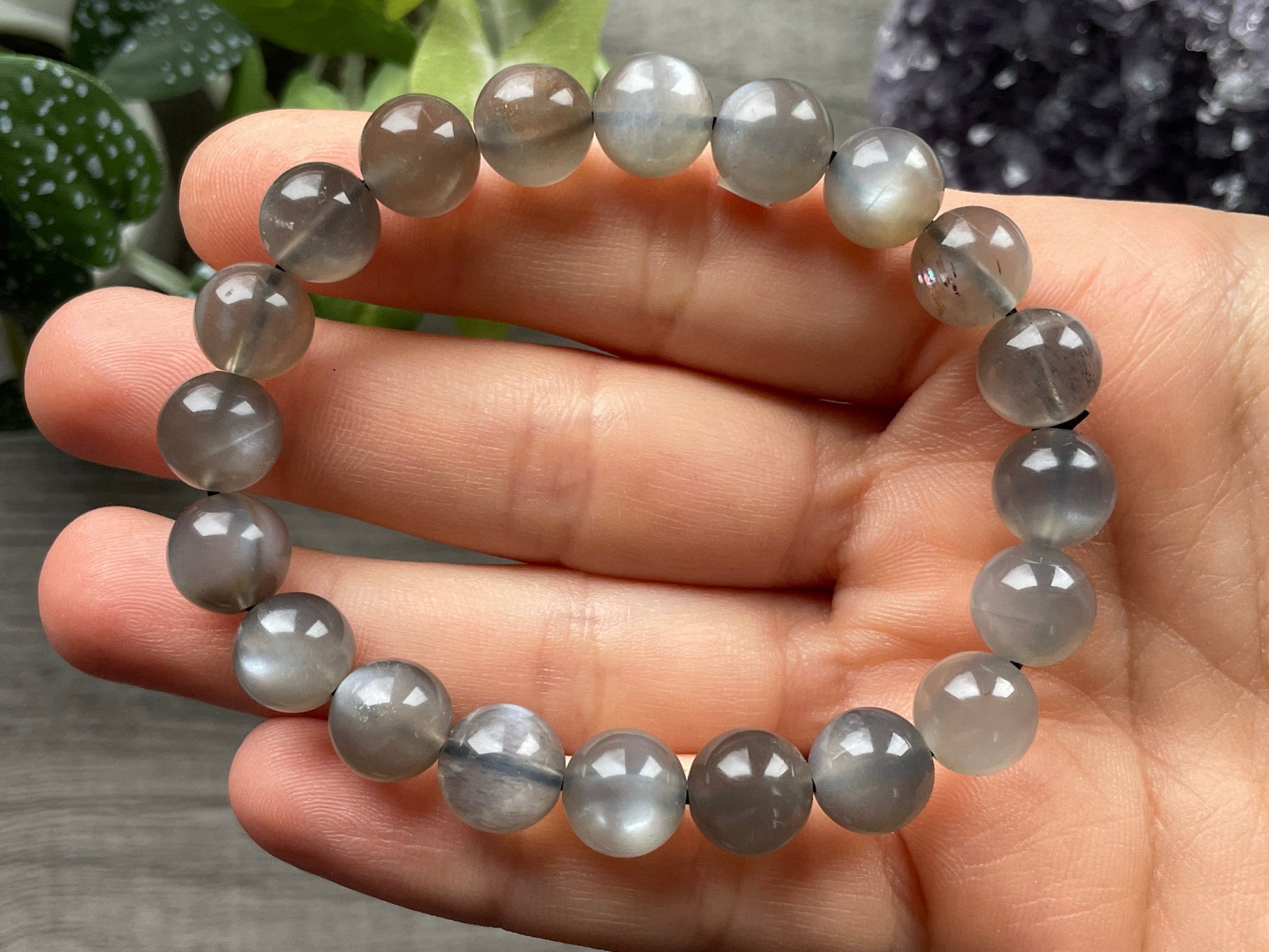 Pictured is a grey moonstone bead bracelet.